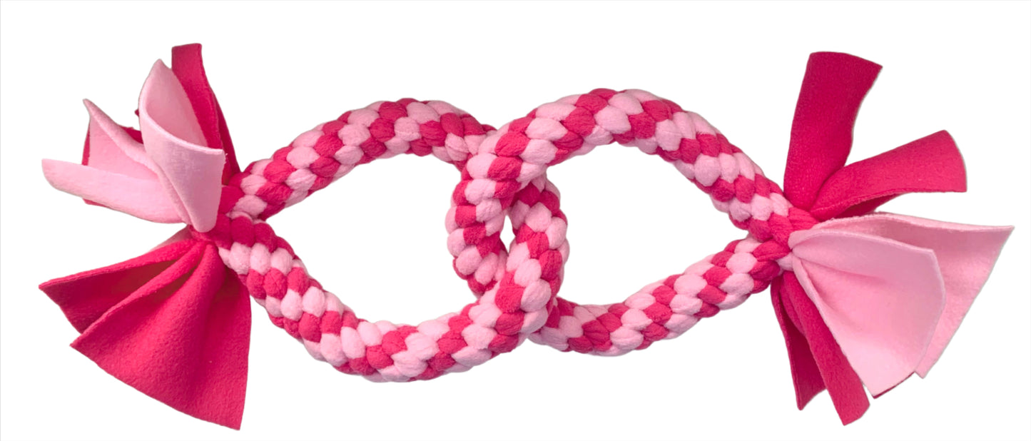This is a dog toy for large dogs that features two circles looped together.
