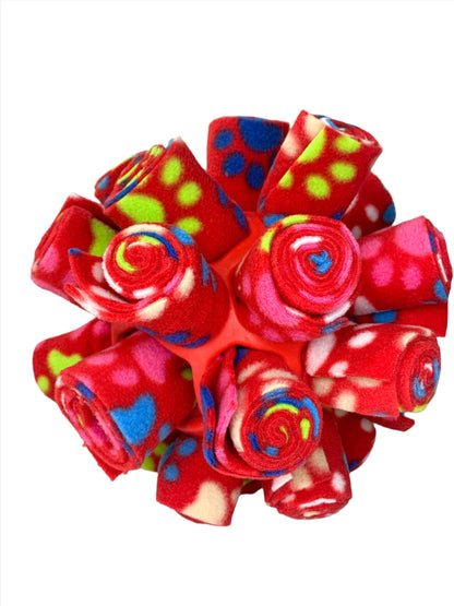 This is a snuffle enrichment cage ball, an enrichment game used for dog's to sniff their treats out.