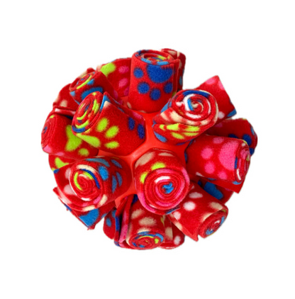 This is a snuffle enrichment cage ball, an enrichment game used for dog's to sniff their treats out.